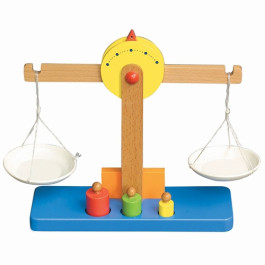 Weegschaal met witte bakjes